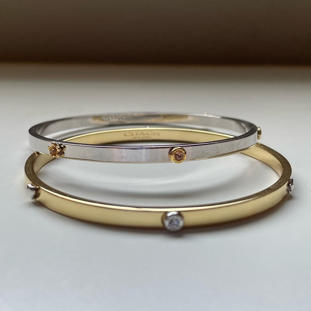 Coach NWOT two piece bangle set gold/silver w/crystals